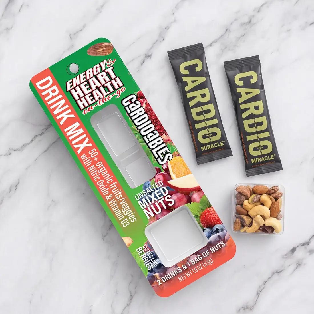 An opened Cardioables pack beside two Cardio Miracle drink sticks and a tray of mixed nuts